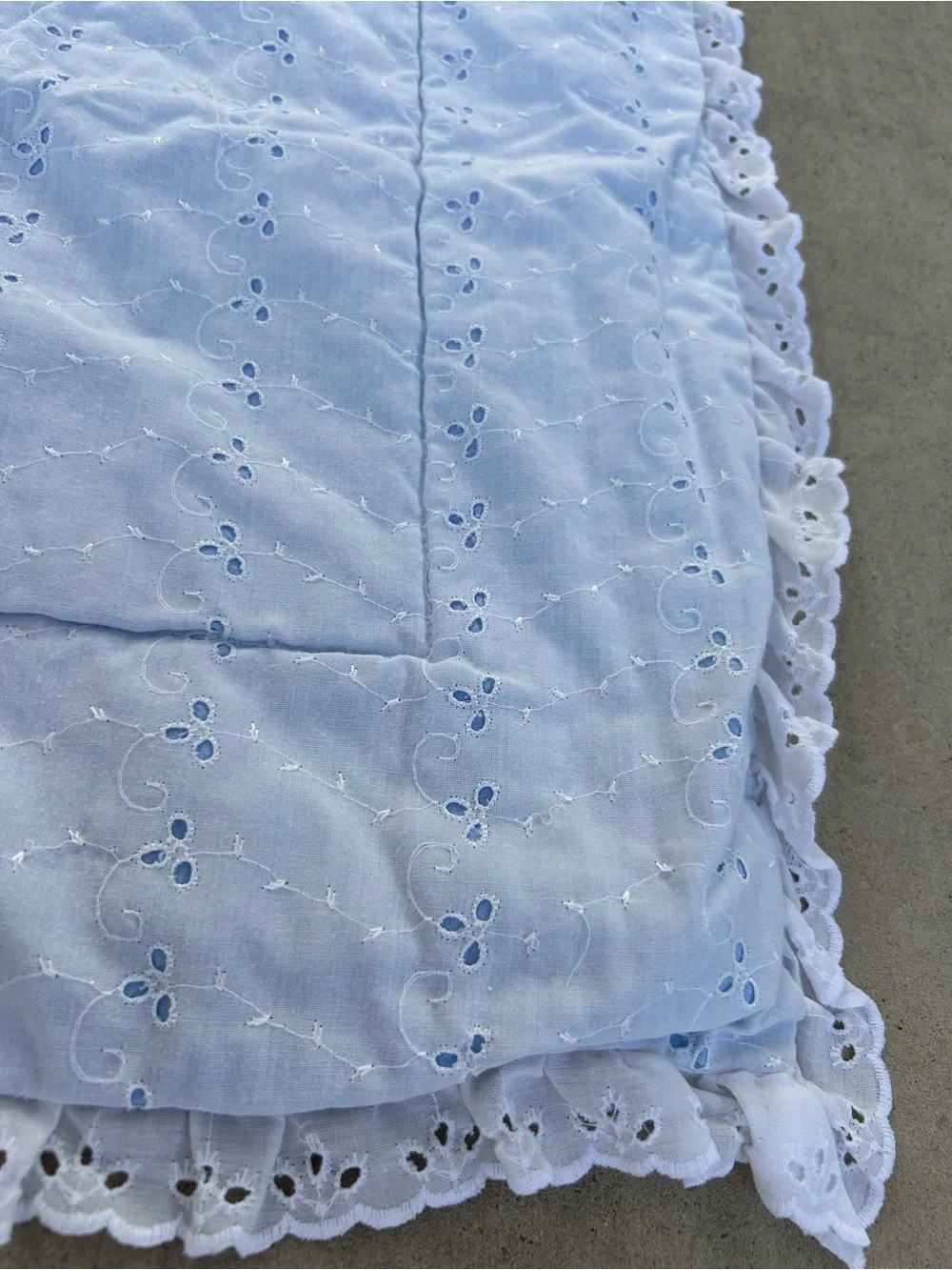 White Eyelet baby blanket white with blue undertone and heart design